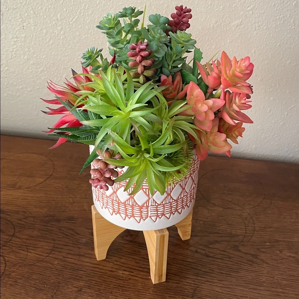 Contemporary Faux Succulent Mix in a Burnt Orange and White Ceramic Footed Vase